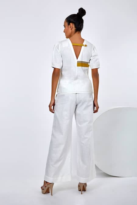Shop Madder Much White , Handloom Roy Asymmetric Top And Saamo Pant Set at Aza Fashions Shop_Madder Much_White , Handloom Roy Asymmetric Top And Saamo Pant Set _at_Aza_Fashions