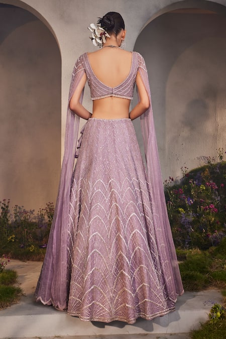 Shop Charu And Vasundhara Purple Net Beads, Stones, Cut Work V-neck Lisa Embroidered Lehenga And Blouse Set at Aza Fashions Shop_Charu And Vasundhara_Purple Net Beads, Stones, Cut Work V-neck Lisa Embroidered Lehenga And Blouse Set _at_Aza_Fashions