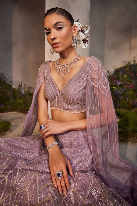 Shop Charu And Vasundhara Purple Net Beads, Stones, Cut Work V-neck Lisa Embroidered Lehenga And Blouse Set Online at Aza Fashions Shop_Charu And Vasundhara_Purple Net Beads, Stones, Cut Work V-neck Lisa Embroidered Lehenga And Blouse Set _Online_at_Aza_Fashions