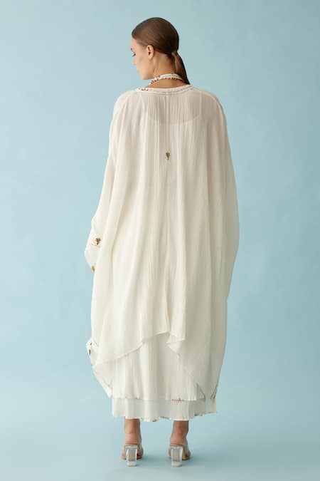 Shop Nikasha Off White V-neck Banana Tree Applique Kaftan And Skirt Set at Aza Fashions Shop_Nikasha_Off White V-neck Banana Tree Applique Kaftan And Skirt Set _at_Aza_Fashions