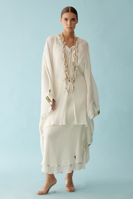 Buy Nikasha Off White V-neck Banana Tree Applique Kaftan And Skirt Set Online at Aza Fashions Buy_Nikasha_Off White V-neck Banana Tree Applique Kaftan And Skirt Set _Online_at_Aza_Fashions