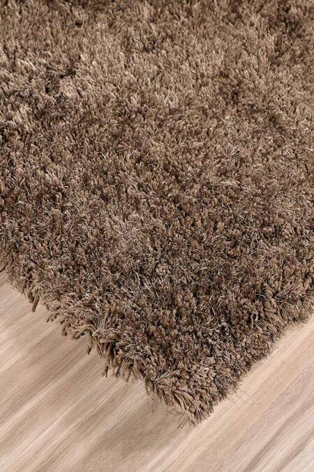 Shop Kaleen India Brown 100% Polyester Hand Tufted Solid Rectangle Rug Online at Aza Fashions Shop_Kaleen India_Brown 100% Polyester Hand Tufted Solid Rectangle Rug_Online_at_Aza_Fashions