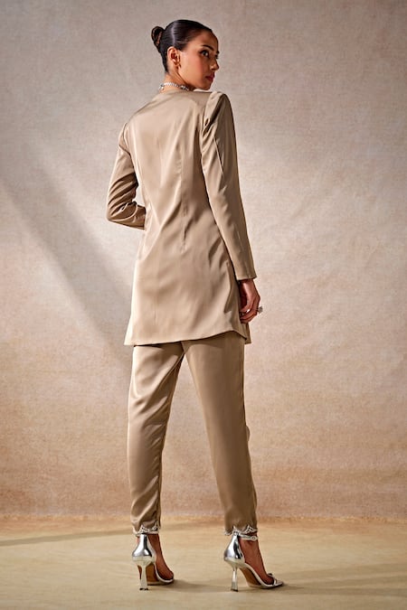 Shop Studio22 By Pulkita Arora Bajaj Beige Satin Sequins, Constellation Embellished Bloom Cut Work Kurta With Pant at Aza Fashions Shop_Studio22 By Pulkita Arora Bajaj_Beige Satin Sequins, Constellation Embellished Bloom Cut Work Kurta With Pant _at_Aza_Fashions