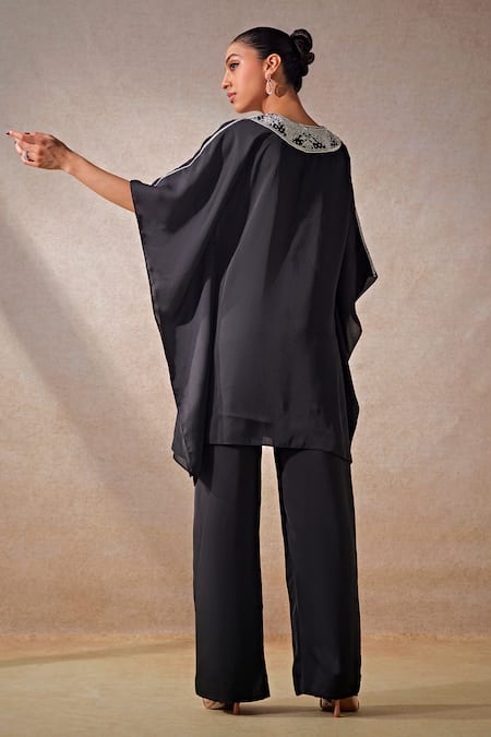 Shop Studio22 By Pulkita Arora Bajaj Black Satin, New Moon Glass Beaded Neckline Embellished Kaftan With Pant at Aza Fashions Shop_Studio22 By Pulkita Arora Bajaj_Black Satin, New Moon Glass Beaded Neckline Embellished Kaftan With Pant _at_Aza_Fashions