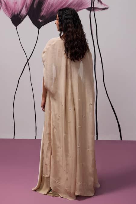 Shop Zoon Beige Satin Sequins Round Neck Floral Embroidered Cape Draped Skirt at Aza Fashions Shop_Zoon_Beige Satin Sequins Round Neck Floral Embroidered Cape Draped Skirt _at_Aza_Fashions