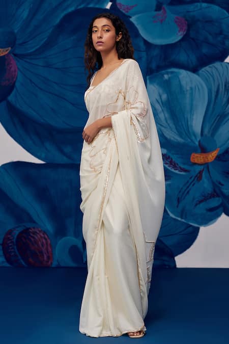Shop Zoon Ivory Georgette Sequins, Floral Embroidered Pre-draped Saree With Blouse Online at Aza Fashions Shop_Zoon_Ivory Georgette Sequins, Floral Embroidered Pre-draped Saree With Blouse _Online_at_Aza_Fashions