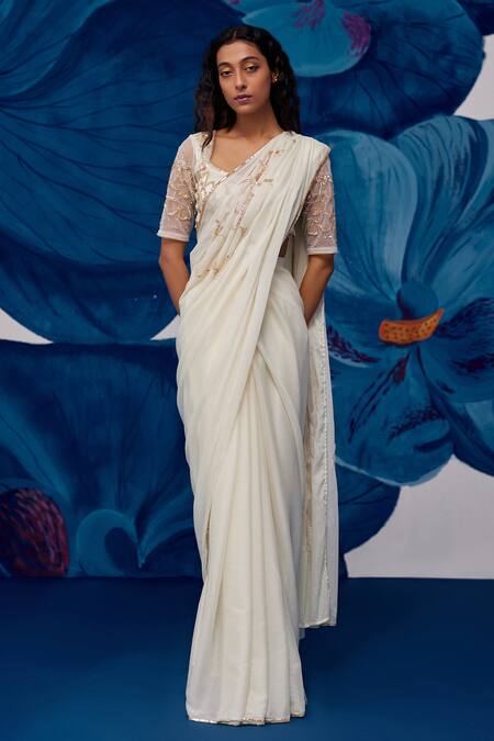 Zoon Ivory Georgette Sequins, Floral Embroidered Pre-draped Saree With Blouse at Aza Fashions Zoon_Ivory Georgette Sequins, Floral Embroidered Pre-draped Saree With Blouse _at_Aza_Fashions
