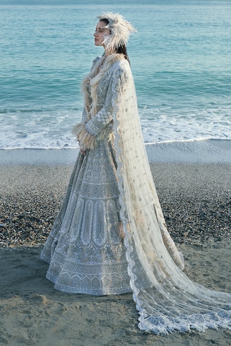 Shop Eeksha Ivory Tulle Cut Work, Pearls, Sequins New Age Embroidered Lehenga Set at Aza Fashions Shop_Eeksha_Ivory Tulle Cut Work, Pearls, Sequins New Age Embroidered Lehenga Set _at_Aza_Fashions