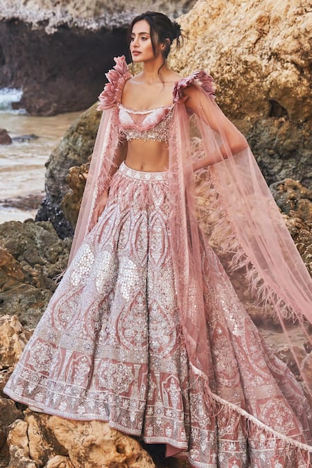 Shop Eeksha Pink Net Pearls, New Age Floral Embroidered Lehenga Withy Winged Bustier at Aza Fashions Shop_Eeksha_Pink Net Pearls, New Age Floral Embroidered Lehenga Withy Winged Bustier _at_Aza_Fashions
