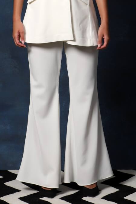 Swatee Singh Ivory Crepe Halter Neck Blazer Top With Bell Bottom Pant at Aza Fashions Swatee Singh_Ivory Crepe Halter Neck Blazer Top With Bell Bottom Pant _at_Aza_Fashions