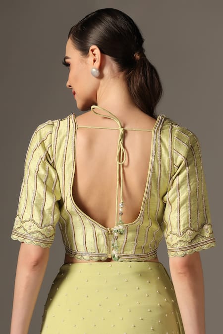 Yashodhara_Green Chiffon, Silk Cut Work V-neck Cutdana Embroidered Pre-draped Ruffle Saree _Online_at_Aza_Fashions