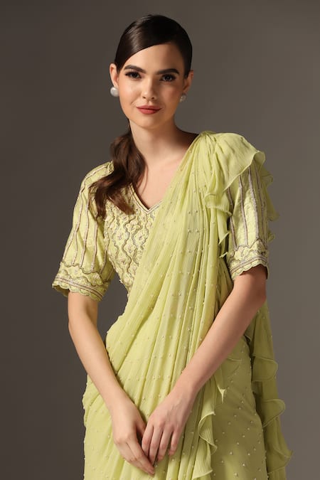Yashodhara_Green Chiffon, Silk Cut Work V-neck Cutdana Embroidered Pre-draped Ruffle Saree _at_Aza_Fashions