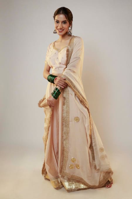 Shop Pants And Pajamas Peach Chanderi Sequins, Zari, Tassels Placement Embroidered Lehenga Skirt Online at Aza Fashions Shop_Pants And Pajamas_Peach Chanderi Sequins, Zari, Tassels Placement Embroidered Lehenga Skirt _Online_at_Aza_Fashions