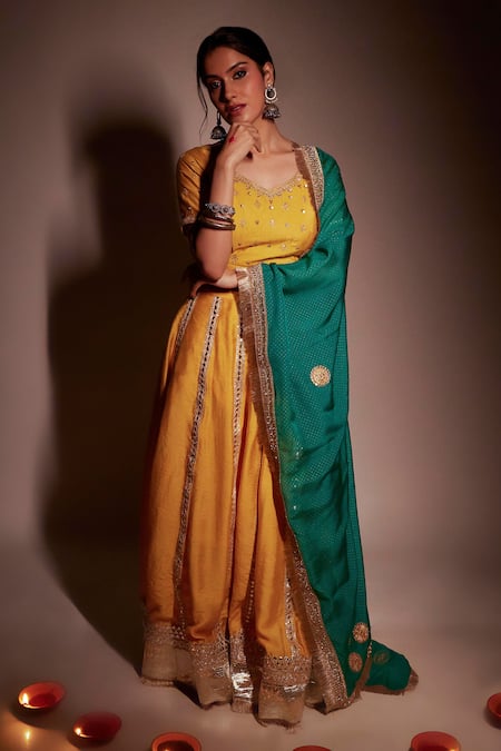 Shop_Pants And Pajamas_Yellow Chanderi Tassels, Gota Patti Embroidered Lehenga Skirt _Online_at_Aza_Fashions