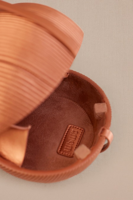 Shop_Ampm_Brown Sukoon Abstract Pattern Sling Bag _Online_at_Aza_Fashions