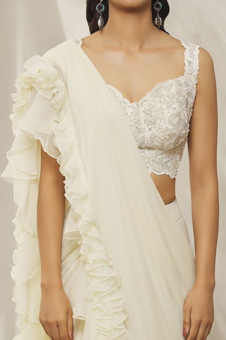 Shop Aariyana Couture Cream Crepe Embroidery, Pearls, Sequins, Pre-draped Ruffle Saree And Blouse Set Online at Aza Fashions Shop_Aariyana Couture_Cream Crepe Embroidery, Pearls, Sequins, Pre-draped Ruffle Saree And Blouse Set_Online_at_Aza_Fashions