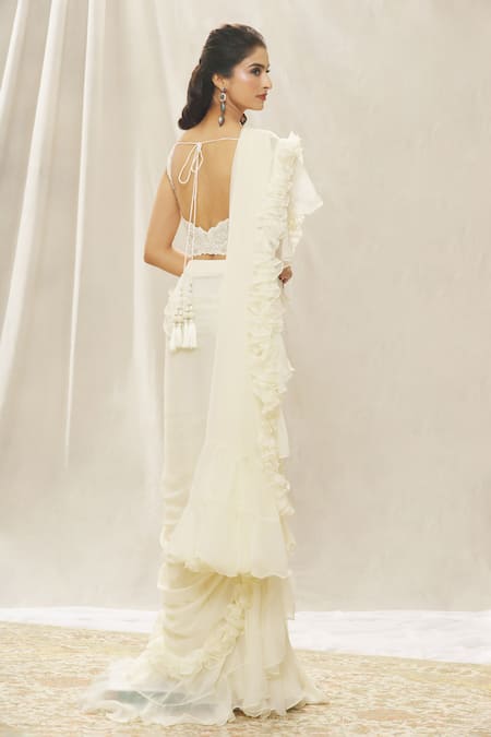 Shop Aariyana Couture Cream Crepe Embroidery, Pearls, Sequins, Pre-draped Ruffle Saree And Blouse Set at Aza Fashions Shop_Aariyana Couture_Cream Crepe Embroidery, Pearls, Sequins, Pre-draped Ruffle Saree And Blouse Set_at_Aza_Fashions