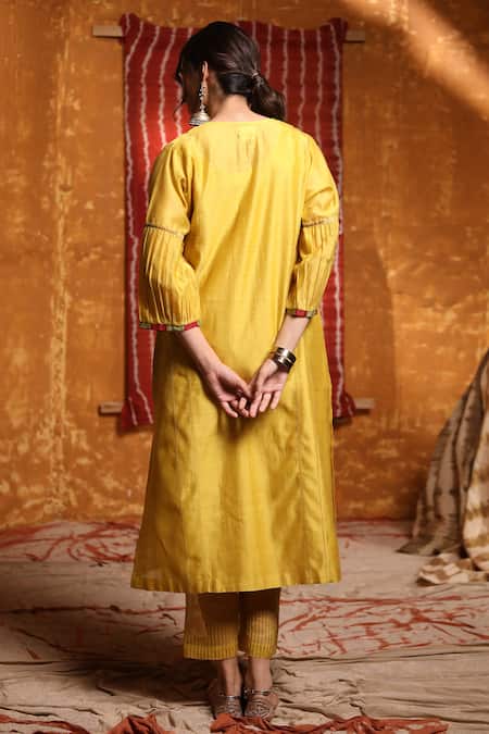 Shop_Shivani Bhargava_Yellow Handloom Chanderi Hand Embroidered Tribal Round Kurta Set _at_Aza_Fashions