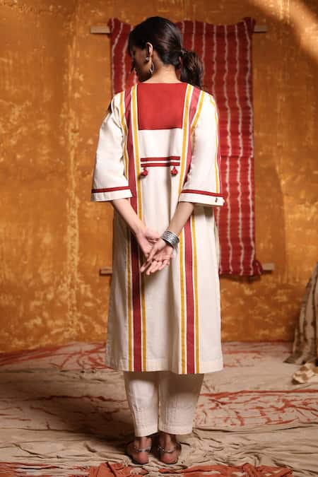 Shop Shivani Bhargava Ivory Cotton Embroidery Thread Notched Colorblock Kurta And Pant Set at Aza Fashions Shop_Shivani Bhargava_Ivory Cotton Embroidery Thread Notched Colorblock Kurta And Pant Set _at_Aza_Fashions
