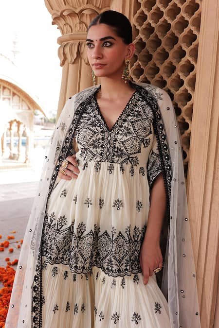 Shop Preevin White Cotton, Net, Tulle Mirrors, Embroidery Floral Peplum Kurta Sharara Set at Aza Fashions Shop_Preevin_White Cotton, Net, Tulle Mirrors, Embroidery Floral Peplum Kurta Sharara Set _at_Aza_Fashions