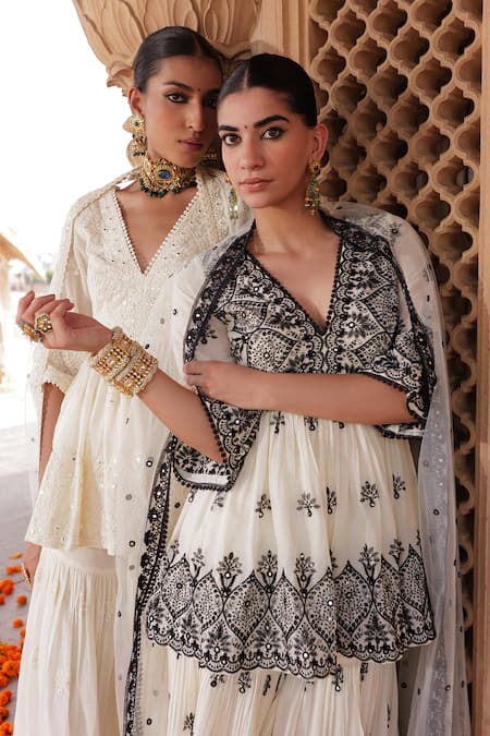 Preevin White Cotton, Net, Tulle Mirrors, Embroidery Floral Peplum Kurta Sharara Set Online at Aza Fashions Preevin_White Cotton, Net, Tulle Mirrors, Embroidery Floral Peplum Kurta Sharara Set _Online_at_Aza_Fashions