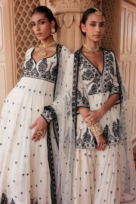 Buy Preevin White Cotton, Net, Tulle Floral Mirrorwork Embellished Peplum Kurta Sharara Set Online at Aza Fashions Buy_Preevin_White Cotton, Net, Tulle Floral Mirrorwork Embellished Peplum Kurta Sharara Set _Online_at_Aza_Fashions