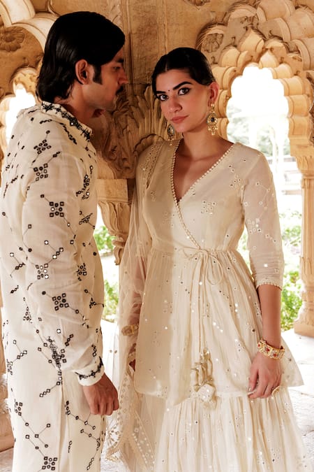 Buy Preevin Off White Tulle, Cotton, Net Lace, Embroidery Thread Angarkha Sharara Set Online at Aza Fashions Buy_Preevin_Off White Tulle, Cotton, Net Lace, Embroidery Thread Angarkha Sharara Set _Online_at_Aza_Fashions