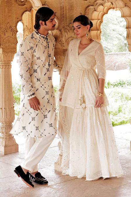 Shop Preevin Off White Tulle, Cotton, Net Lace, Embroidery Thread Angarkha Sharara Set Online at Aza Fashions Shop_Preevin_Off White Tulle, Cotton, Net Lace, Embroidery Thread Angarkha Sharara Set _Online_at_Aza_Fashions