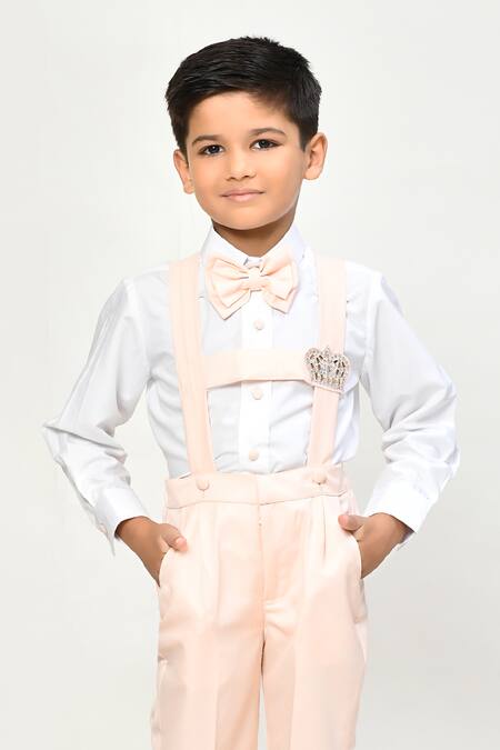 Samyukta Singhania_Peach , Satin Smocking, Stones Crown Embellished Suspender Pant Set _Online_at_Aza_Fashions