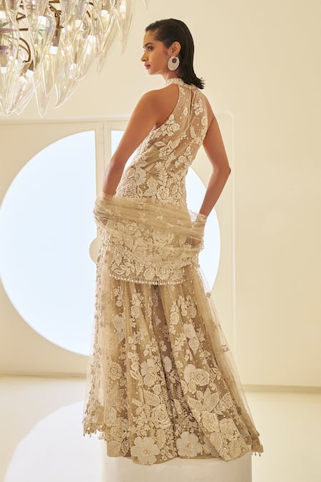 Seema Gujral_Beige Net Lace, Sequins, Embroidery Halter Neck Floral Sheer Kurta Sharara Set _Online_at_Aza_Fashions