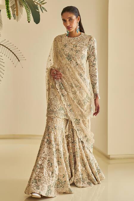 Buy_Seema Gujral_Beige Net Pearls, Cut Work, Sequins Round Floral Embellished Kurta Sharara Set _Online_at_Aza_Fashions