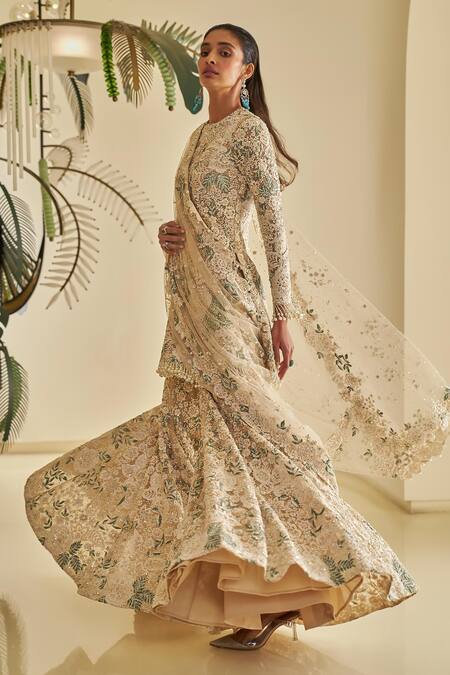 Shop_Seema Gujral_Beige Net Pearls, Cut Work, Sequins Round Floral Embellished Kurta Sharara Set _Online_at_Aza_Fashions