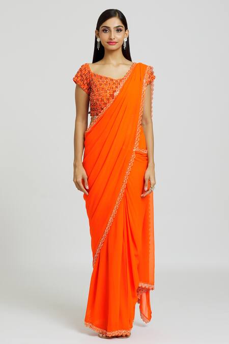 Buy_Nitisha Kashyap Official_Orange Silk, Georgette Beads, Cut Work Border Embroidered Saree With Blouse _Online_at_Aza_Fashions