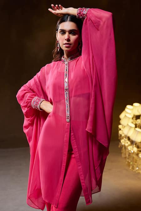 Buy Divya Aggarwal Fuchsia Muslin Silk Embellished Mirror Cape Band Laurel Placket Pant Set Online at Aza Fashions Buy_Divya Aggarwal_Fuchsia Muslin Silk Embellished Mirror Cape Band Laurel Placket Pant Set _Online_at_Aza_Fashions