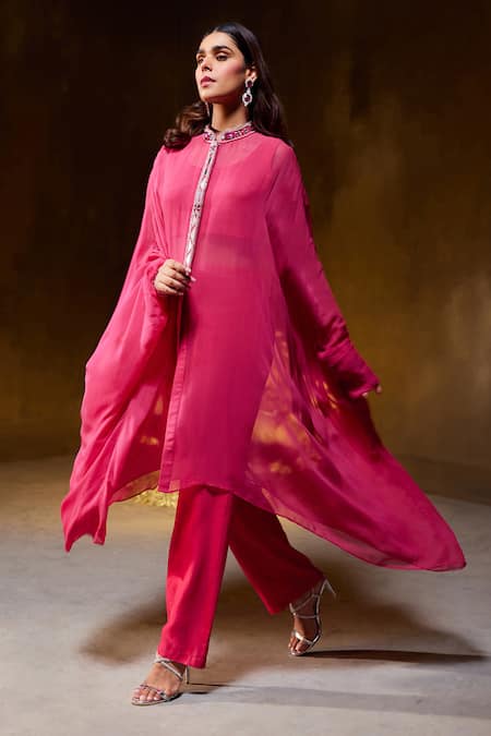 Divya Aggarwal Fuchsia Muslin Silk Embellished Mirror Cape Band Laurel Placket Pant Set at Aza Fashions Divya Aggarwal_Fuchsia Muslin Silk Embellished Mirror Cape Band Laurel Placket Pant Set _at_Aza_Fashions