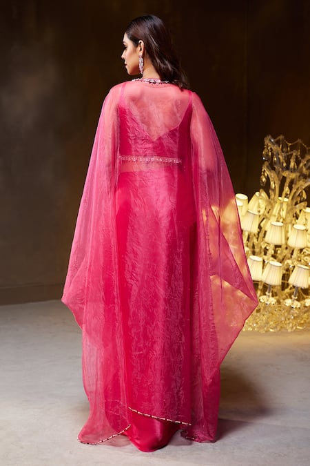 Divya Aggarwal Fuchsia Heavy Satin Embellished Beads Leaf Neck Rose Border Cape Skirt Set Online at Aza Fashions Divya Aggarwal_Fuchsia Heavy Satin Embellished Beads Leaf Neck Rose Border Cape Skirt Set _Online_at_Aza_Fashions