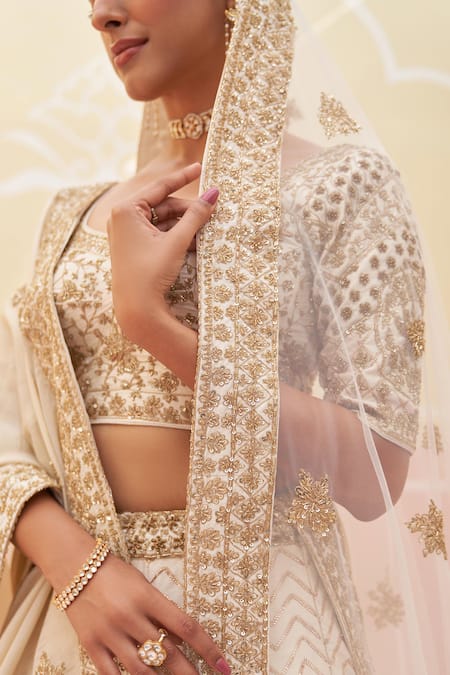 Buy Angad Singh Ivory Silk, Crepe Diamonds, Embroidery, Zari Zardozi And Dabka Bridal Lehenga Set Online at Aza Fashions Buy_Angad Singh_Ivory Silk, Crepe Diamonds, Embroidery, Zari Zardozi And Dabka Bridal Lehenga Set _Online_at_Aza_Fashions