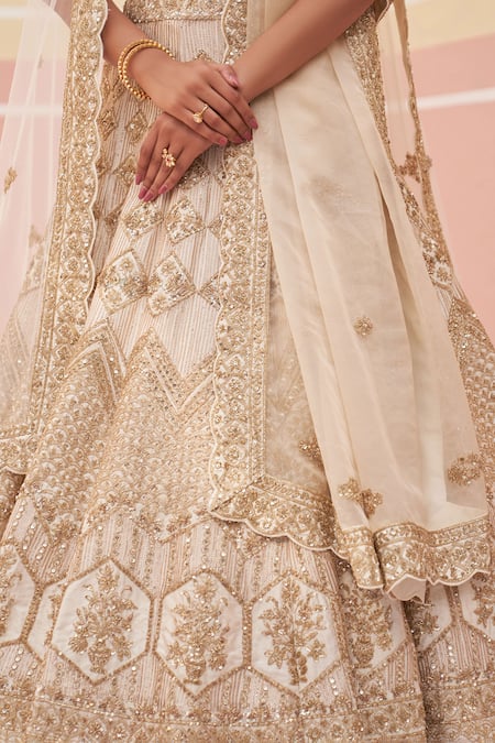 Angad Singh Ivory Silk, Crepe, Chiffon Zari, Sequins, Embroidered Bridal Lehenga Set Online at Aza Fashions Angad Singh_Ivory Silk, Crepe, Chiffon Zari, Sequins, Embroidered Bridal Lehenga Set _Online_at_Aza_Fashions