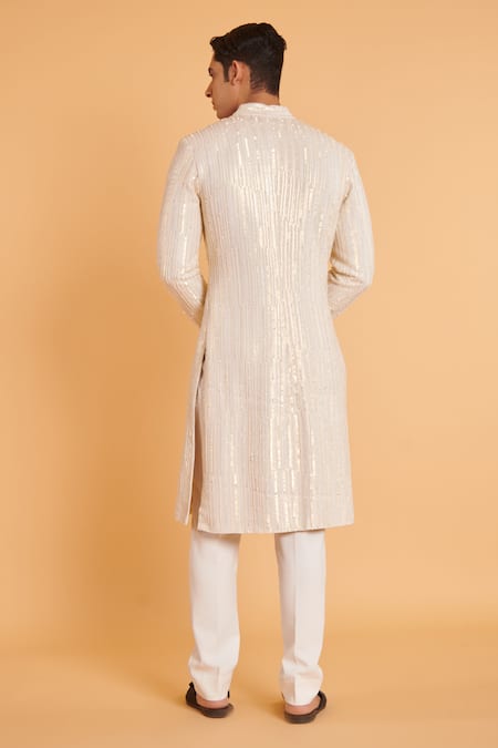 Shop Siddartha Tytler Ivory Silk, Lycra Sequins Embellished Sherwani With Pant at Aza Fashions Shop_Siddartha Tytler_Ivory Silk, Lycra Sequins Embellished Sherwani With Pant _at_Aza_Fashions