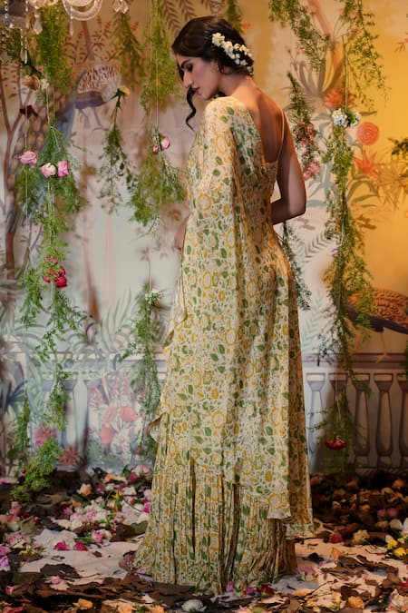 Shop Aayushi Maniar Ivory Net, Silk Sequins, Beads Sweetheart Mogra Floral Print Cape Gharara Set at Aza Fashions Shop_Aayushi Maniar_Ivory Net, Silk Sequins, Beads Sweetheart Mogra Floral Print Cape Gharara Set _at_Aza_Fashions