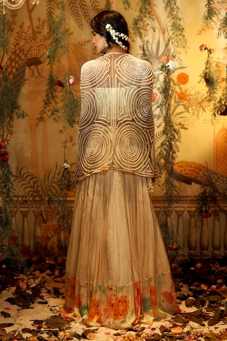 Shop Aayushi Maniar Ivory Silk, Georgette, Crepe Pearls Chandini Lehenga Embroidered Cape Set at Aza Fashions Shop_Aayushi Maniar_Ivory Silk, Georgette, Crepe Pearls Chandini Lehenga Embroidered Cape Set _at_Aza_Fashions