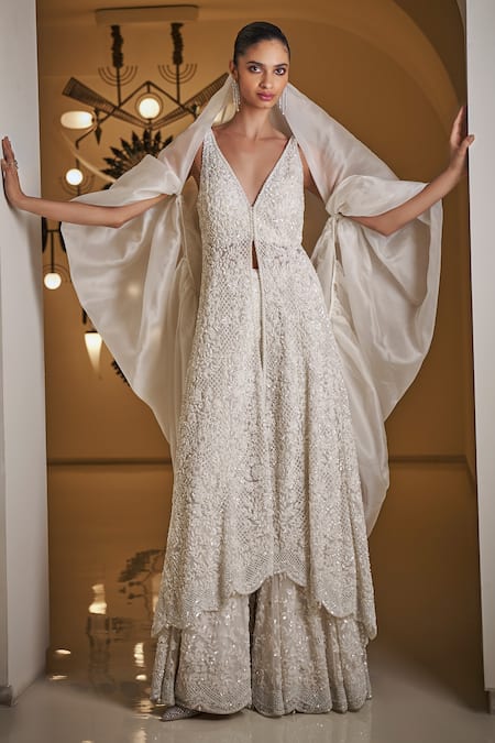 Shop Seema Gujral White Net Embroidery, Pearls, Sequins V-neck Jacket Sharara Set Online at Aza Fashions Shop_Seema Gujral_White Net Embroidery, Pearls, Sequins V-neck Jacket Sharara Set _Online_at_Aza_Fashions
