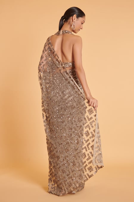 Shop Siddartha Tytler Grey Net Sequins Halter Neck Hand Embroidered Saree With Blouse at Aza Fashions Shop_Siddartha Tytler_Grey Net Sequins Halter Neck Hand Embroidered Saree With Blouse _at_Aza_Fashions