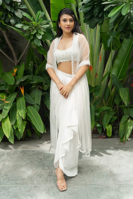 Aakansha Gupta Ivory Net Dahlia Bloom Embroidery Open Neck Cape Draped Skirt Set 