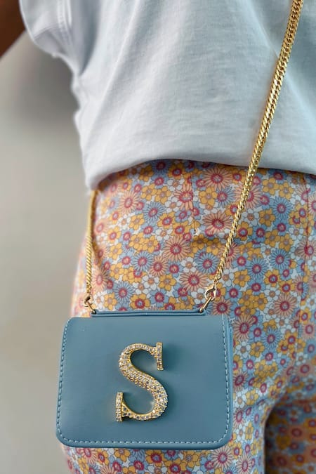 Shop PRERTO Blue Initial Ornamented Vegan Leather Bag at Aza Fashions Shop_PRERTO_Blue Initial Ornamented Vegan Leather Bag _at_Aza_Fashions