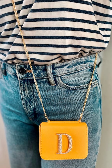 Buy_PRERTO_Yellow Sunshine Initial Ornamented Vegan Leather Bag _Online_at_Aza_Fashions