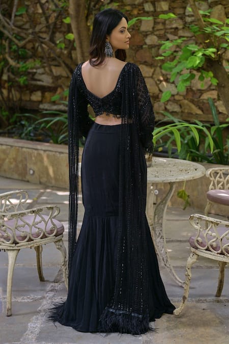 Shop Saangi Black Net, Crepe Cut Work Split V-neck Embroidered Blouse And Fish Lehenga Set at Aza Fashions Shop_Saangi_Black Net, Crepe Cut Work Split V-neck Embroidered Blouse And Fish Lehenga Set _at_Aza_Fashions