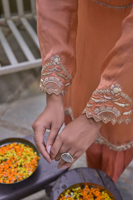 Shop Saangi Peach Modal, Satin Sequins, Beads, Floral Embroidered Kurta And Dhoti Pant Set Online at Aza Fashions Shop_Saangi_Peach Modal, Satin Sequins, Beads, Floral Embroidered Kurta And Dhoti Pant Set_Online_at_Aza_Fashions