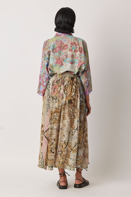 Shop Yavi Brown Modal Ceclia Printed Midi Skirt at Aza Fashions Shop_Yavi_Brown Modal Ceclia Printed Midi Skirt _at_Aza_Fashions