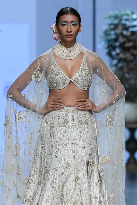 Paulmi And Harsh Ivory Net Beads, Zari Plunge Neck Floral Embroidered Tail Cut Lehenga Set Online at Aza Fashions Paulmi And Harsh_Ivory Net Beads, Zari Plunge Neck Floral Embroidered Tail Cut Lehenga Set _Online_at_Aza_Fashions